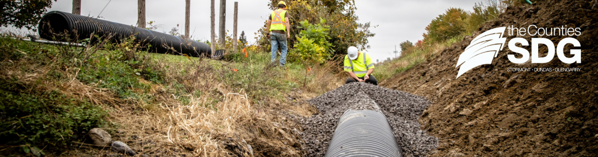 Men work on a culvert replacement.