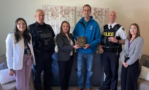 From left are Julia Nagy (Naomi's Staff), OPP Sergeant James Blanchette, Renee Moores (Naomi's Executive Director), MPP Nolan Quinn, OPP SDG Inspector Marc Hemmerick, and Justine White (Naomi's Manager).