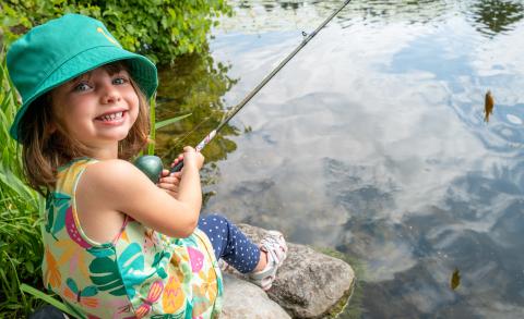 Four-year-old Phoebe from Cornwall is all smiles after catching a pumpkinseed fish during last year's RRCA Family Fishing Day at Gray's Creek Conservation Area in South Glengarry.