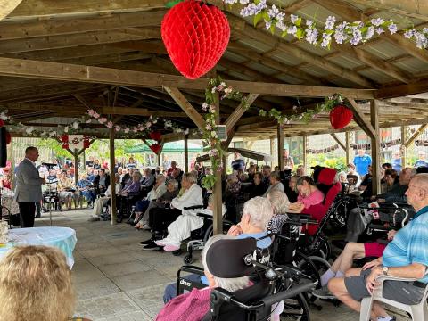 On July 12, the sun smiled down on Dundas Manor as residents, families, staff, and community members came together to celebrate 45 years of caring. The afternoon included a Manor Market of wonderful auction items, a quilt raffle – and, of course, strawberries, ice cream, and birthday cake. 