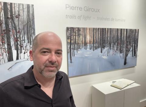 Pierre Giroux at his art show.